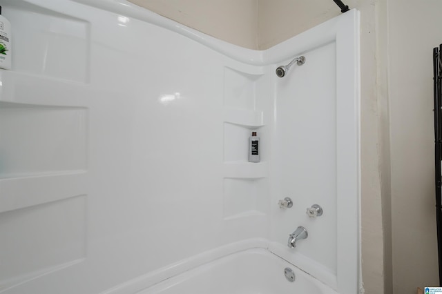 bathroom with shower / bath combination