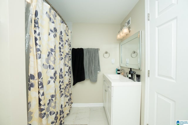 bathroom with vanity and curtained shower