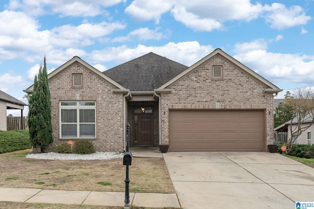 view of front of property featuring a garage