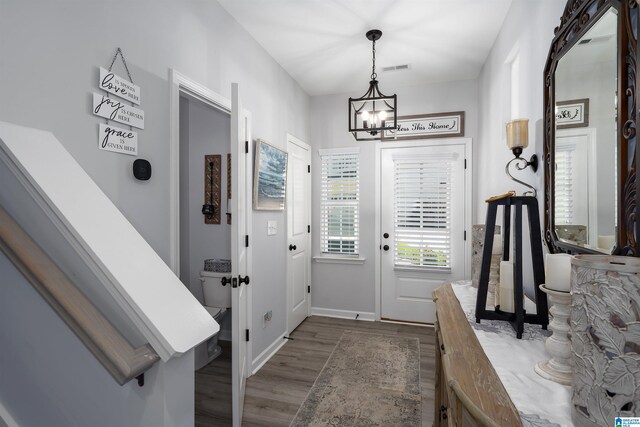 121 Palmer Cv, Birmingham, AL 35242 - doorway to outside featuring a chandelier and dark wood finished floors