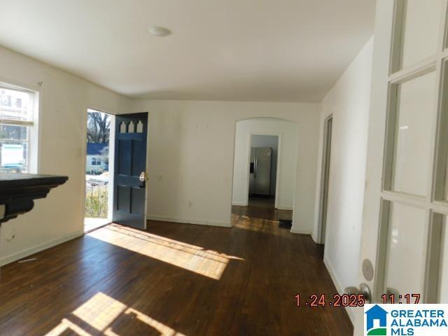 foyer entrance with dark hardwood / wood-style flooring