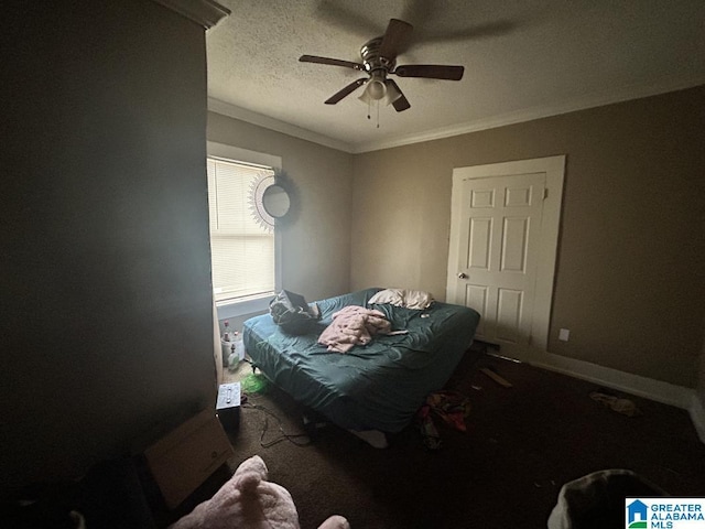 carpeted bedroom with ornamental molding, ceiling fan, and a textured ceiling