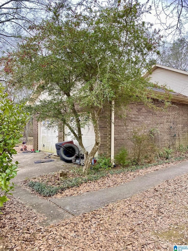 view of side of property featuring a garage