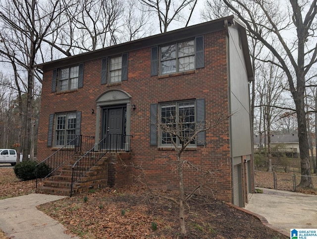 colonial home featuring a garage