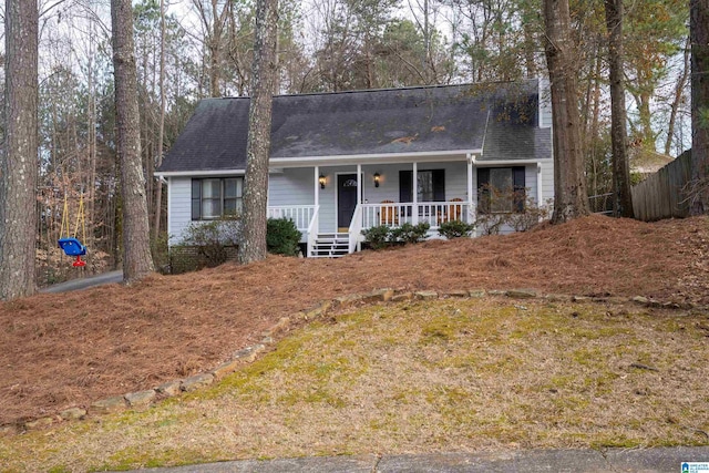 ranch-style home featuring a porch