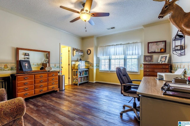 home office featuring ornamental molding, dark wood-type flooring, ceiling fan, and a textured ceiling