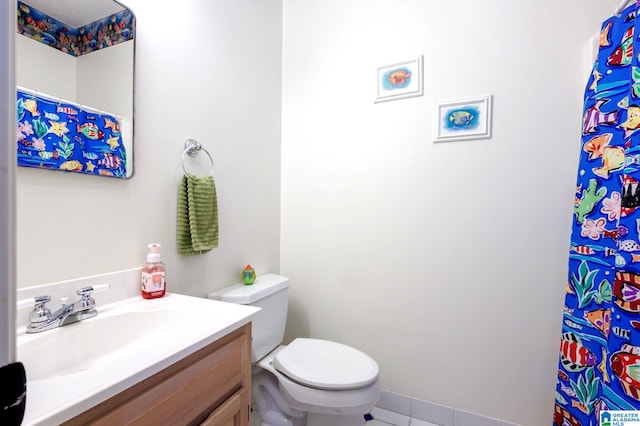 bathroom with vanity and toilet