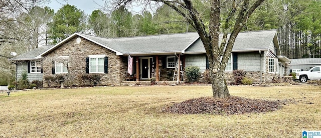 single story home featuring a front yard