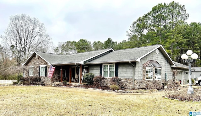 single story home with a garage and a front yard