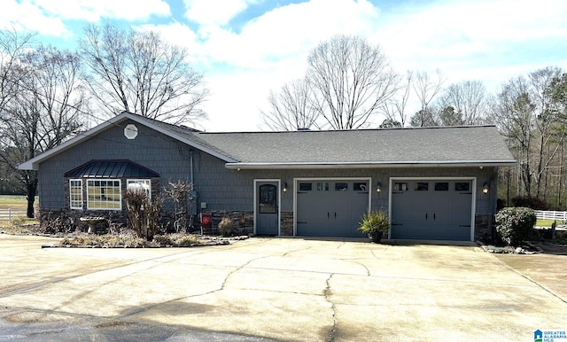 single story home with a garage