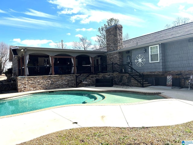 view of pool with a patio area