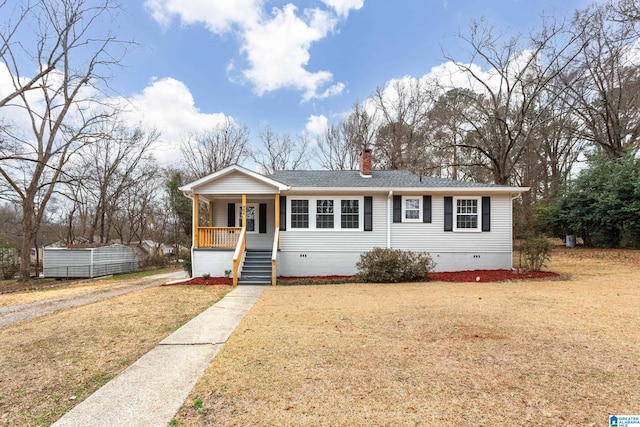 view of front of property with a front lawn and a porch