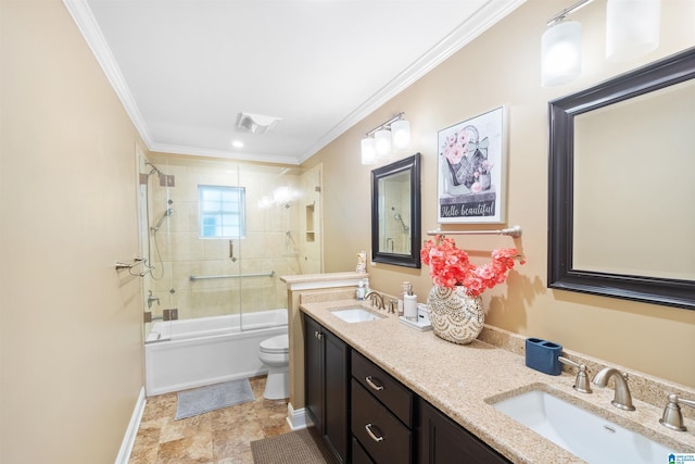 full bathroom featuring ornamental molding, vanity, shower / bath combination with glass door, and toilet