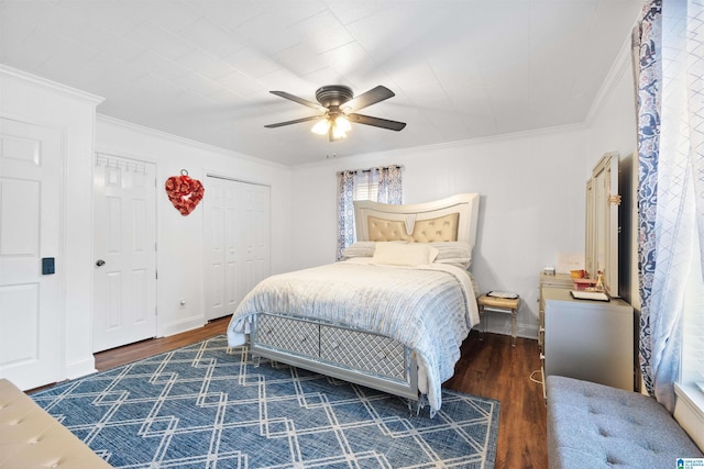 bedroom featuring crown molding, ceiling fan, and dark hardwood / wood-style flooring