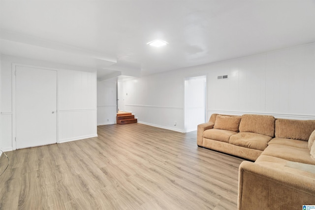 unfurnished living room with light hardwood / wood-style floors