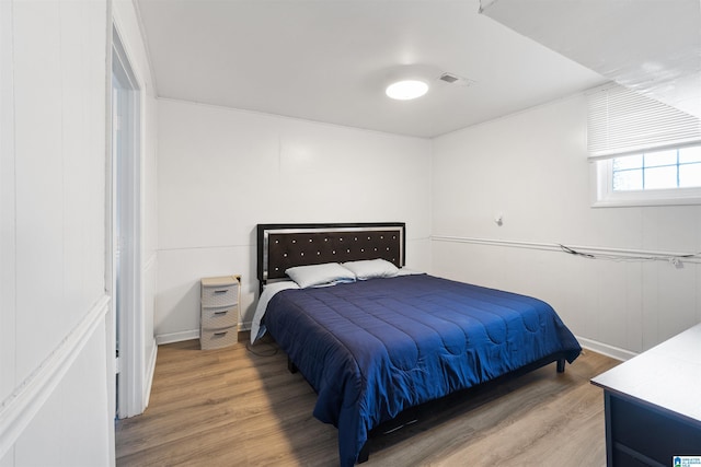 bedroom featuring hardwood / wood-style flooring