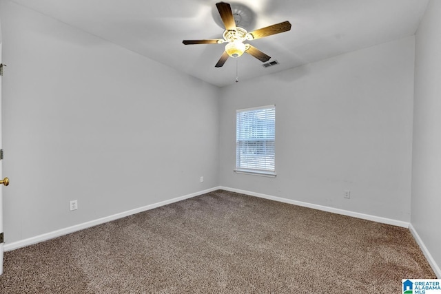 carpeted empty room with ceiling fan