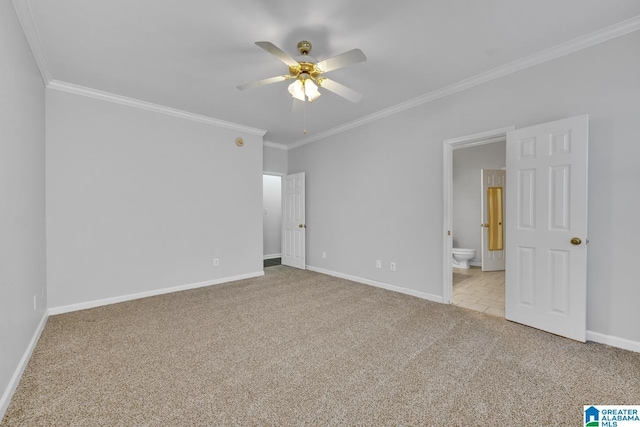 unfurnished bedroom with crown molding, light colored carpet, ceiling fan, and ensuite bath