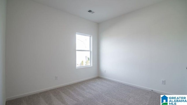 view of carpeted spare room