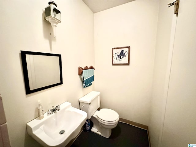 bathroom with sink and toilet