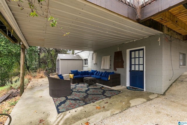 view of patio featuring a storage shed and an outdoor hangout area