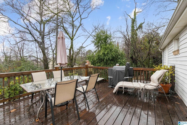 wooden deck featuring grilling area