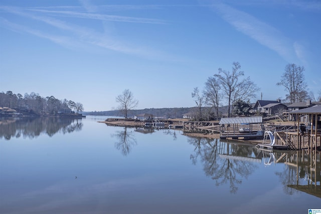 dock area featuring a water view