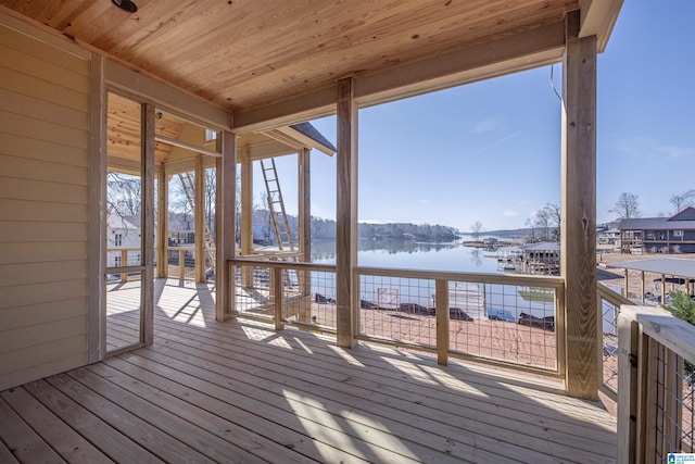 wooden terrace with a water view