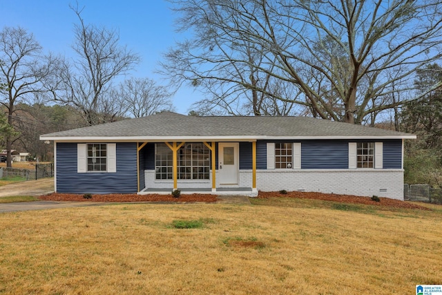 ranch-style home featuring a front yard