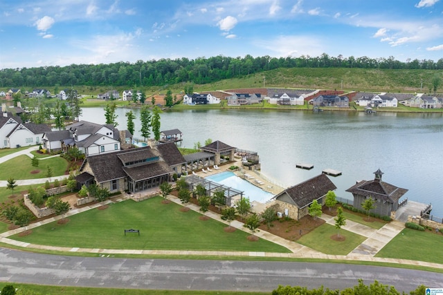 aerial view with a water view and a residential view