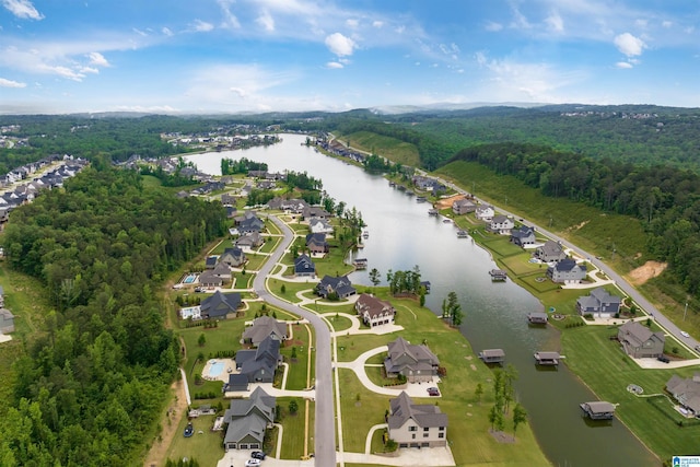 bird's eye view with a residential view and a water view