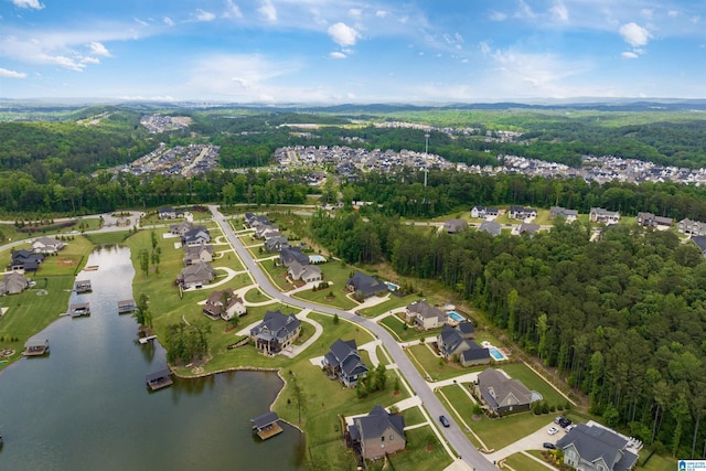 birds eye view of property featuring a water view and a residential view