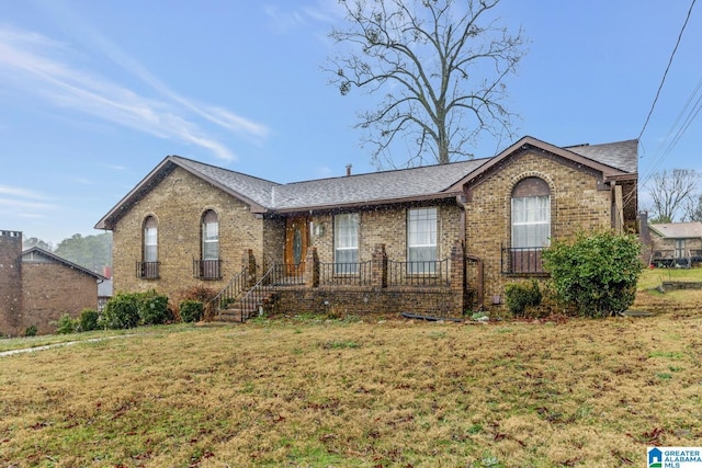 ranch-style house with a front yard