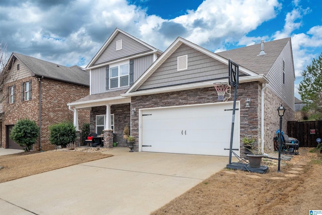 view of front of house with a garage and a porch