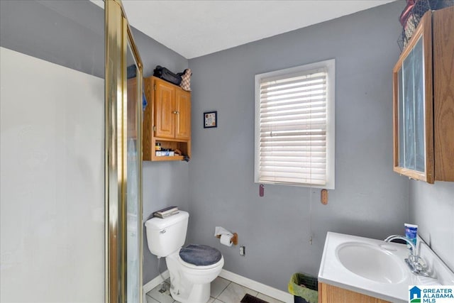 bathroom featuring vanity, an enclosed shower, tile patterned floors, and toilet