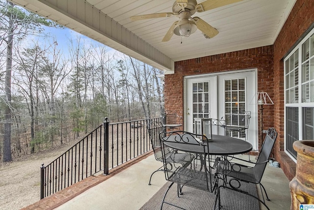 view of patio featuring ceiling fan