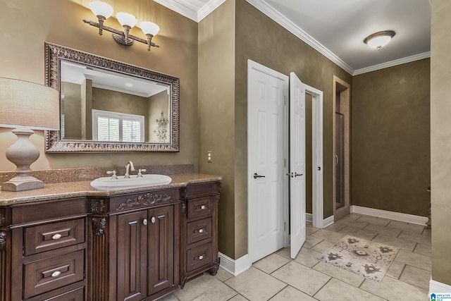 bathroom featuring vanity and ornamental molding