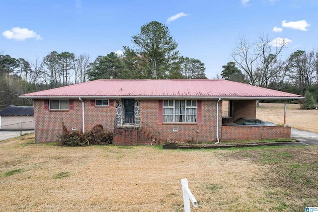 ranch-style home with a front yard