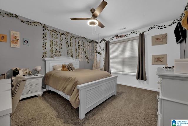 bedroom with ceiling fan and carpet flooring