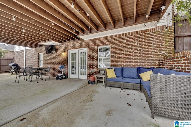 view of patio featuring an outdoor living space and french doors