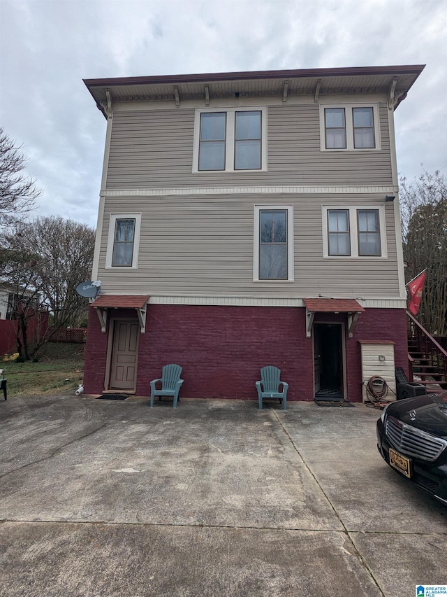 rear view of house with a patio