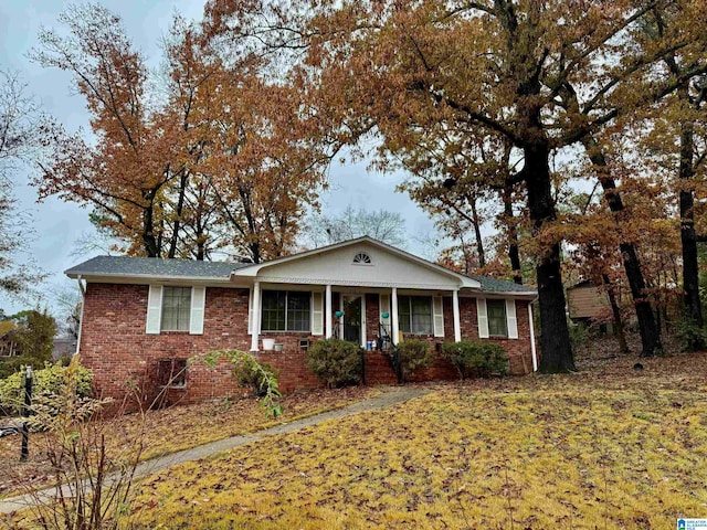 ranch-style house featuring a porch