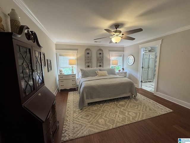 bedroom with baseboards, dark wood-style flooring, ornamental molding, ensuite bathroom, and ceiling fan