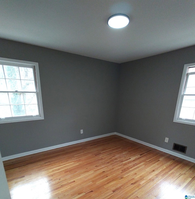 empty room with light wood-type flooring