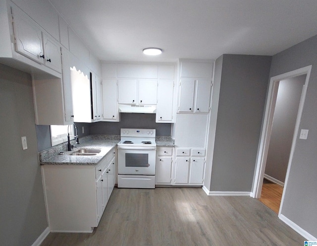 kitchen with sink, light stone counters, white electric stove, hardwood / wood-style flooring, and white cabinets