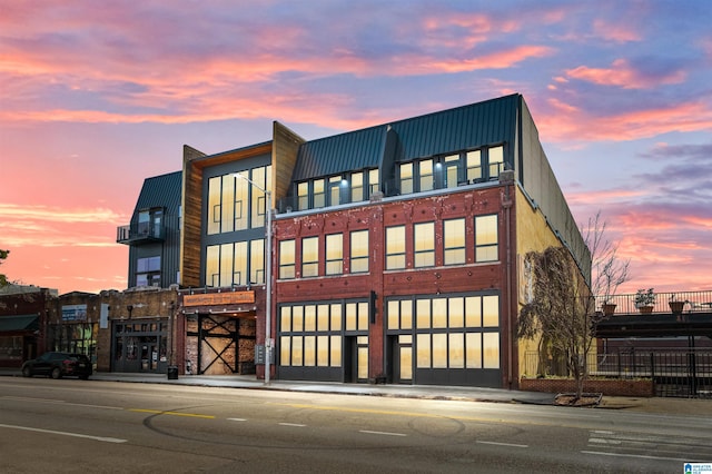 view of property at dusk