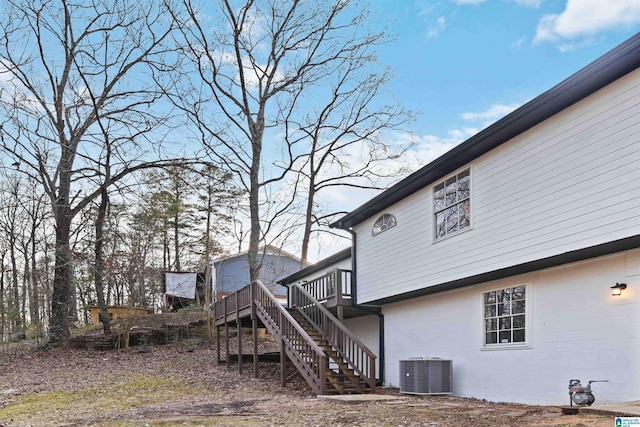 exterior space featuring central AC and a deck