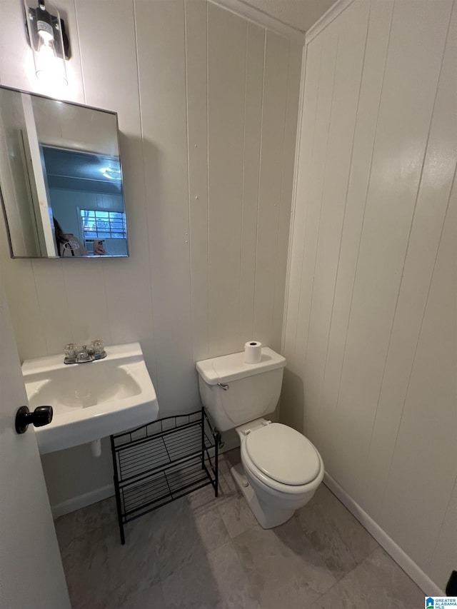 bathroom with sink and toilet