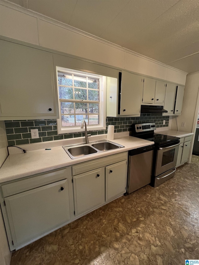 kitchen with white cabinetry, sink, backsplash, and stainless steel appliances