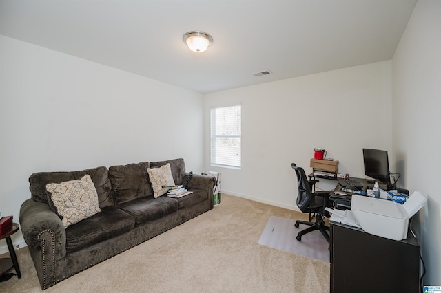 office space with light colored carpet